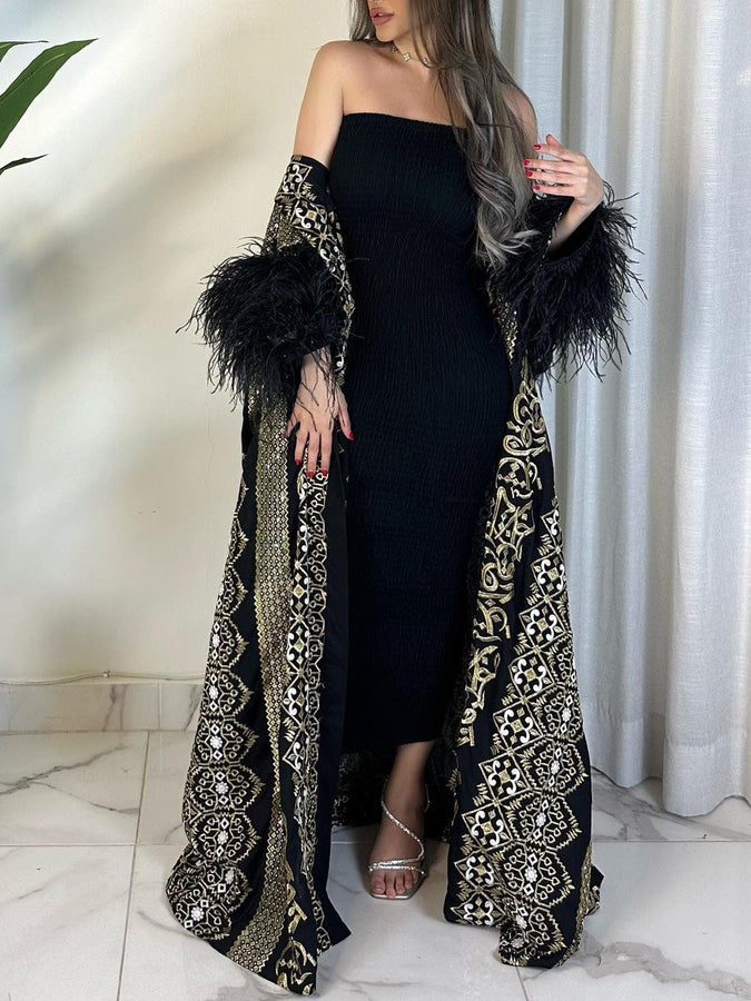 فستان بوستير أسود ومجموعة تونيك أنيقة