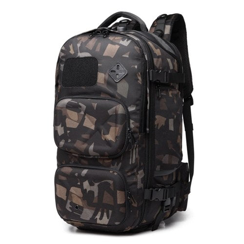 Ozuko نمط جديد في الهواء الطلق على ظهره رجل USB مضاد للسرقة سعة كبيرة متعددة الوظائف مقاوم للماء حقيبة السفر