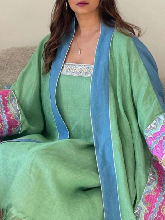 فستان دانتيل أخضر بدون حمالات ومجموعة تونيك مطرزة بالأزهار